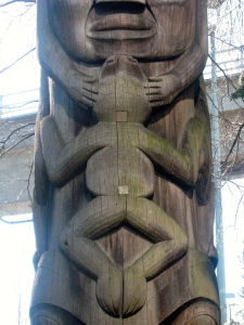 Detail of a frog symbol on a totem pole at the Vancouver Airport, B.C. (Credit: MCArnott)